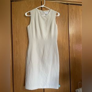 Light cream Calvin Klein size 2 dress. Only wore a couple times. Dry-cleaned.